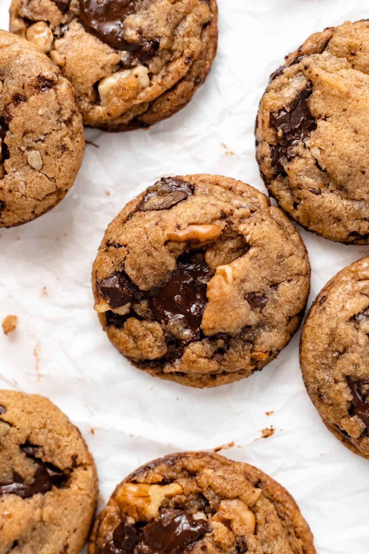 vegan chocolate chip cookies on parchment paper