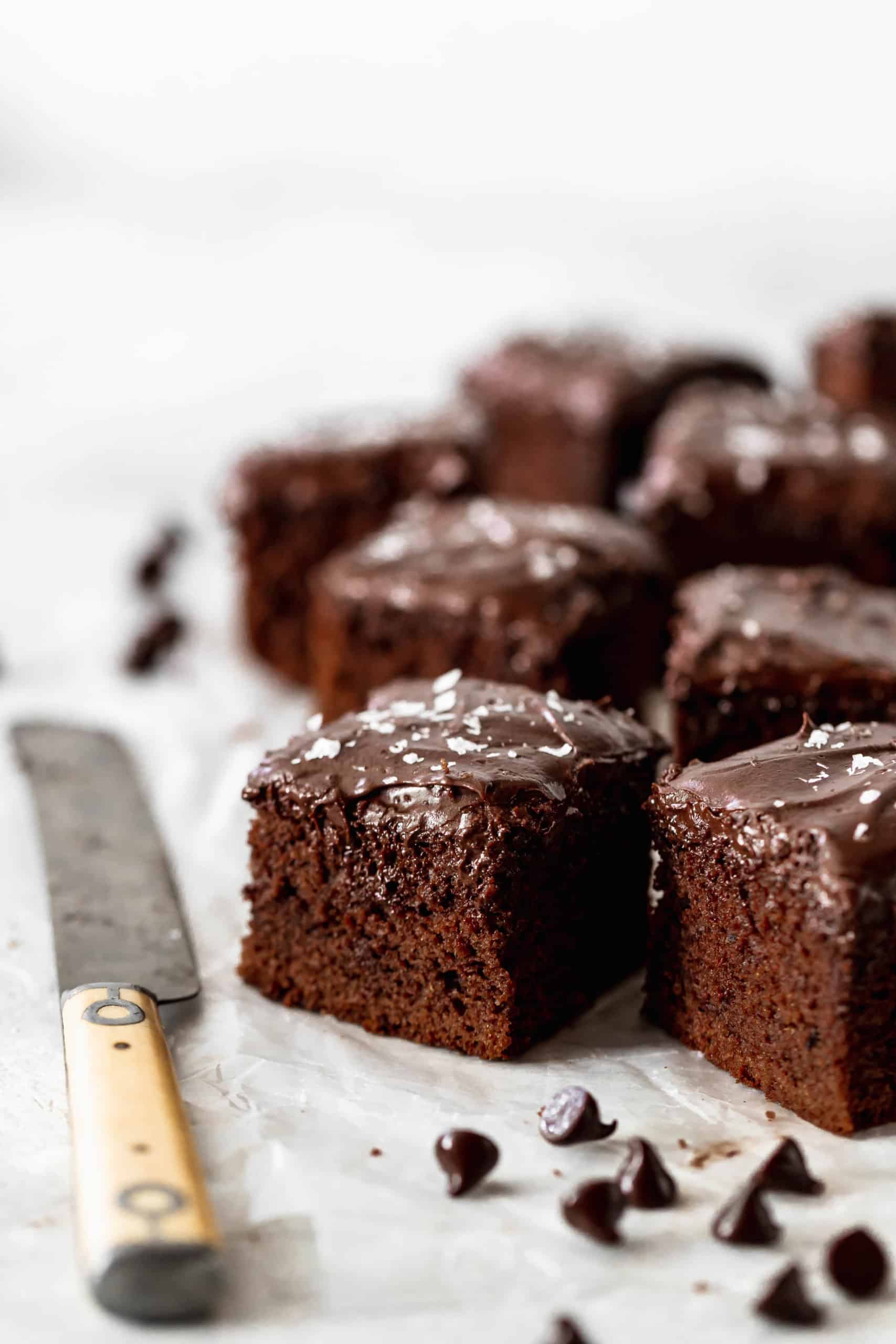 chocolate cake squares on wax paper