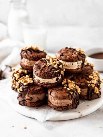 brownie cookie ice cream sandwiches on a marble platter
