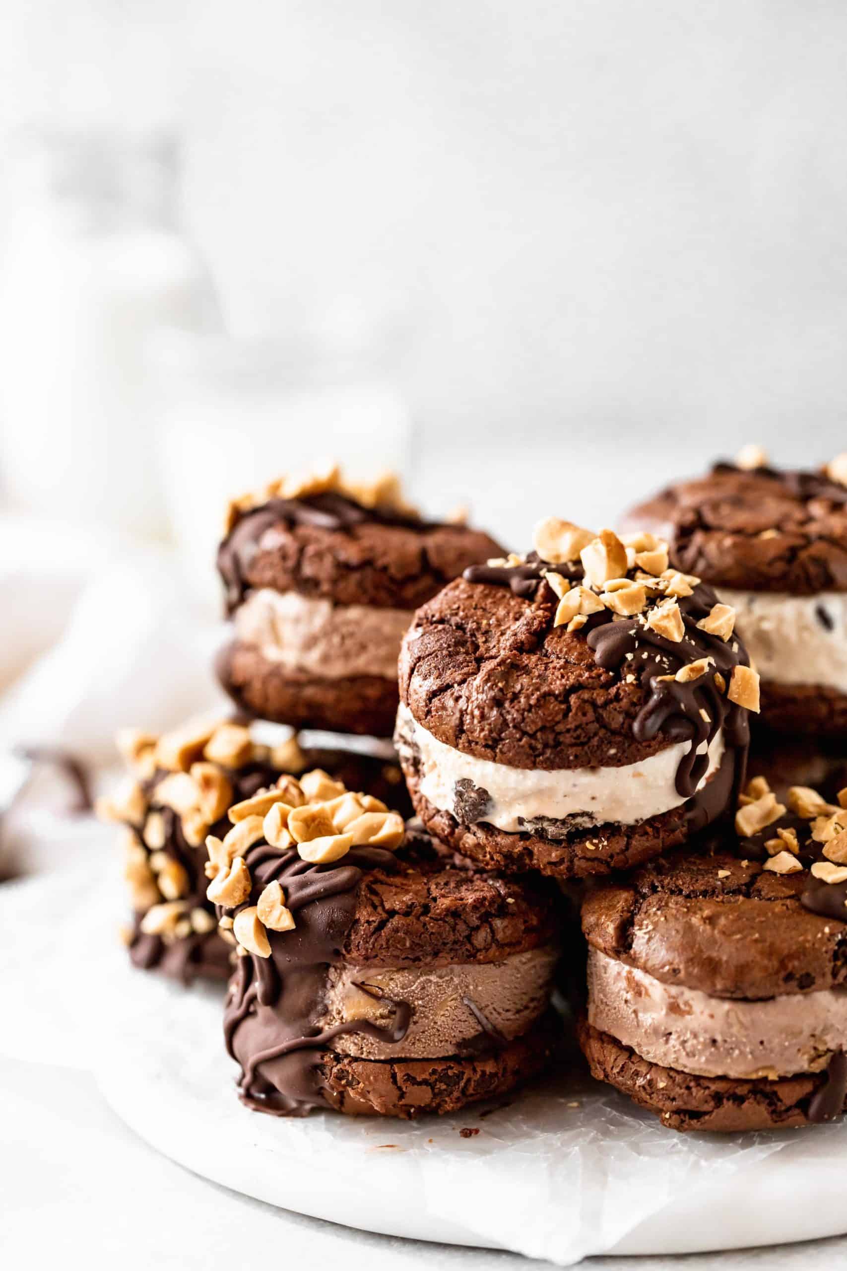 brownie cookie ice cream sandwiches stacked on a platter