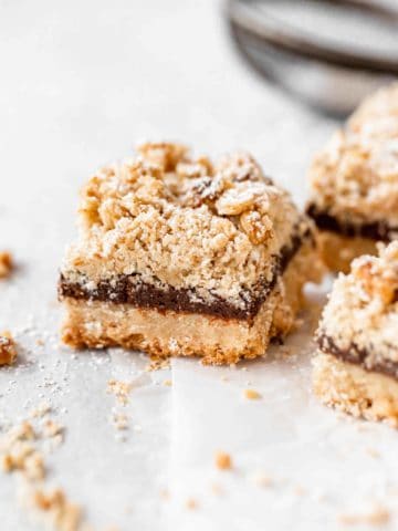 chocolate crumb bars on parchment paper