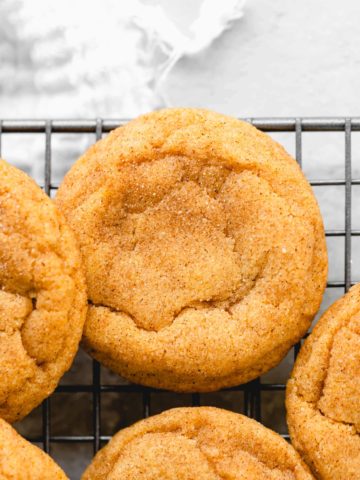 pumpkin snickerdoodles on a wire rack