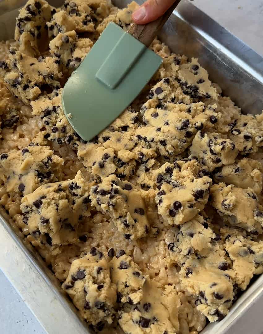 cookie dough pressed over rice krispie treats.