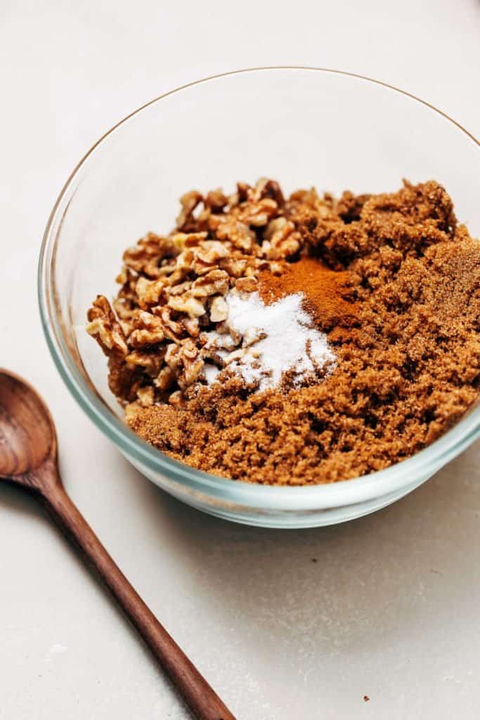 walnuts, brown sugar, and cinnamon in a bowl