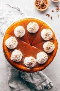 pumpkin cheesecake with caramel sauce and whipped cream