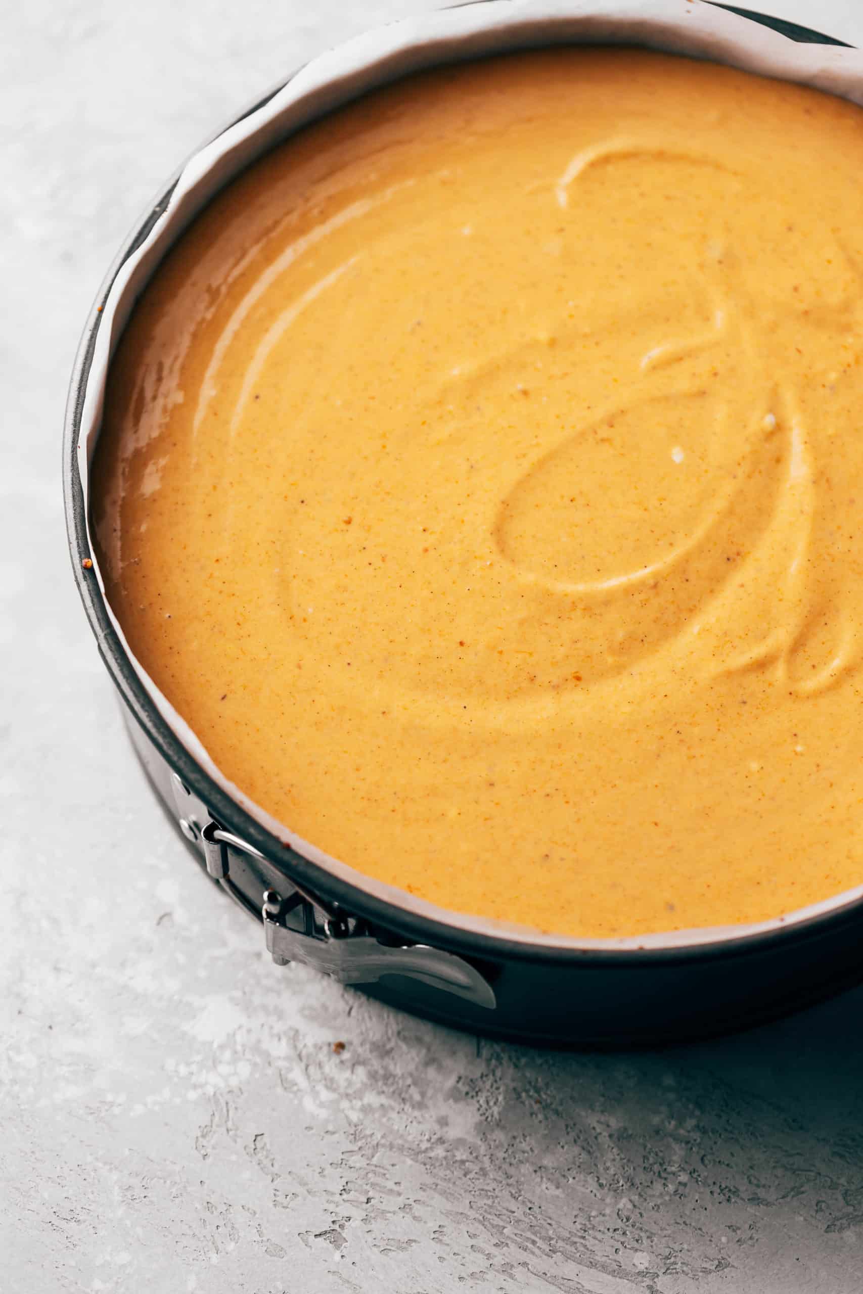 pumpkin cheesecake batter in springform pan