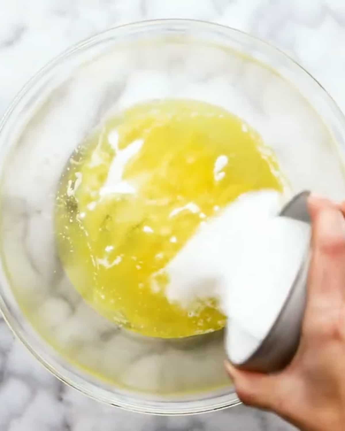 butter, oil, and sugar in a mixing bowl.