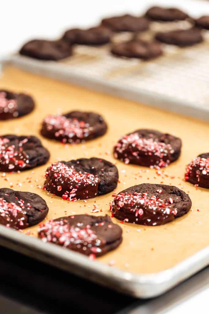 peppermint mocha cookies on a baking sheet in the oven