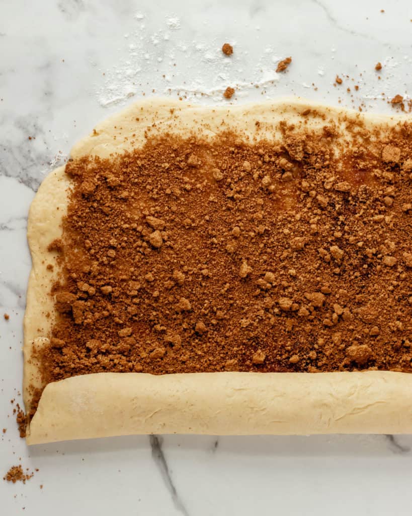 rolling cinnamon rolls