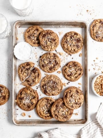 chocolate chip walnut cookies on a baking sheet