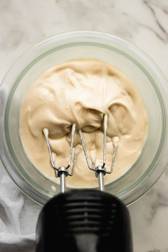 cream cheese frosting a bowl