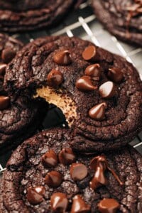 bite shot of a peanut butter stuffed chocolate cookie