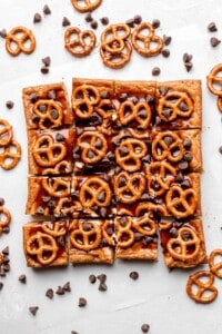 blondies with caramel sauce, pretzels, and chocolate chips