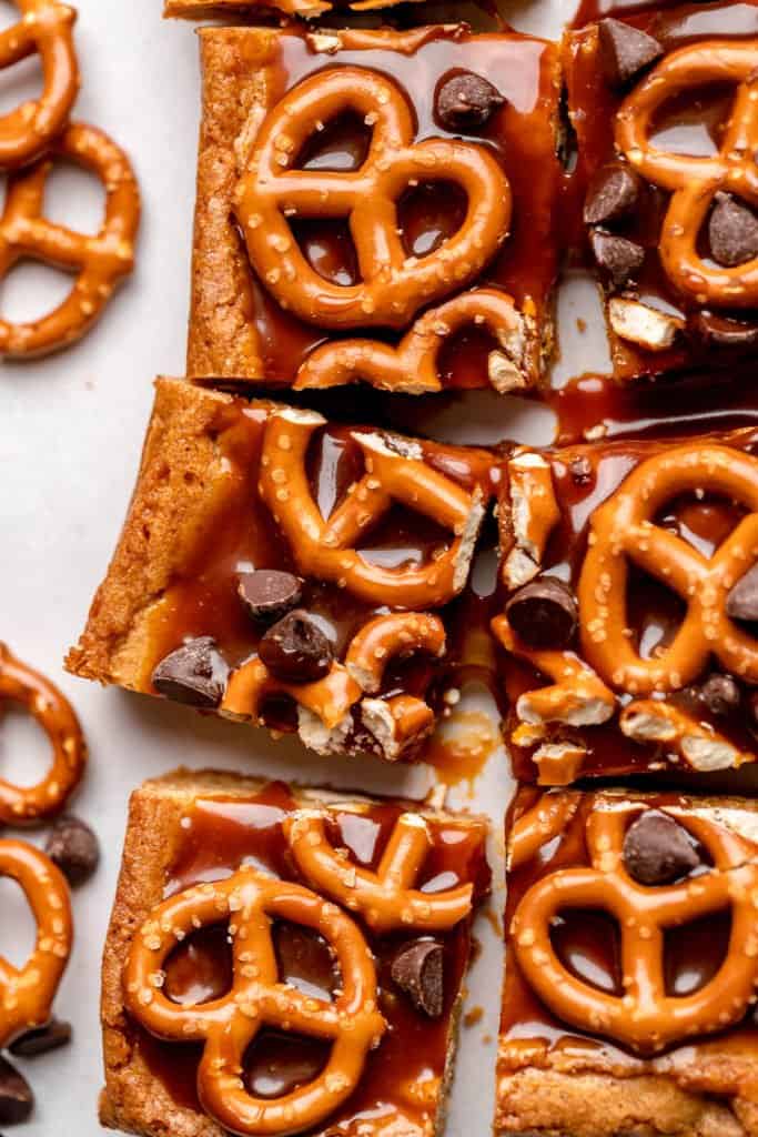 blondies with caramel sauce, pretzels, and chocolate chips