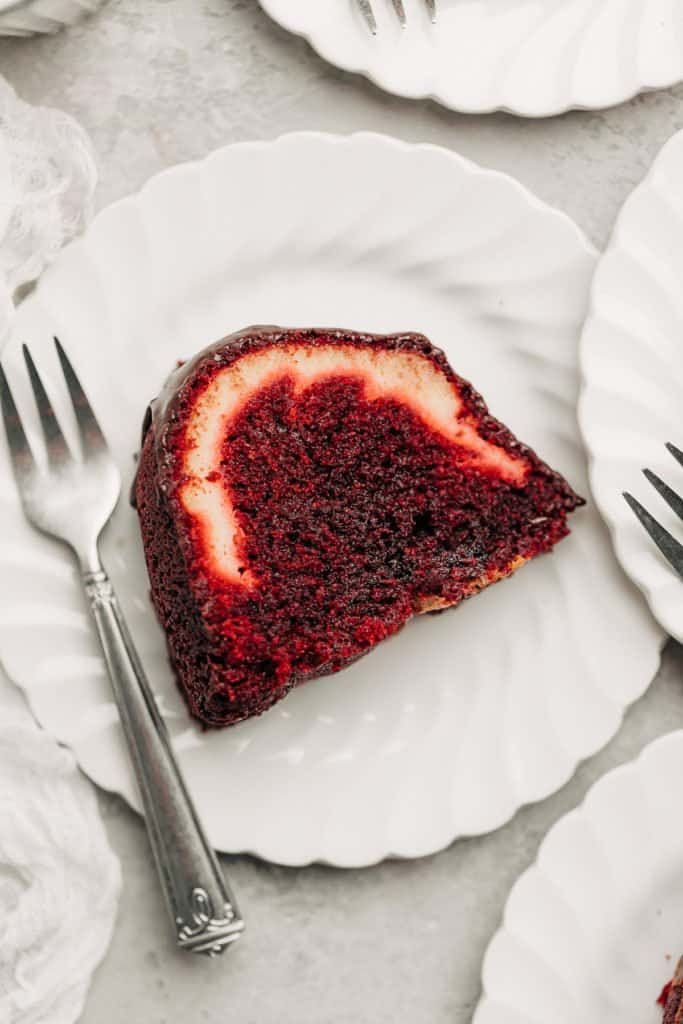 slice of Red Velvet Cream Cheese Bundt Cake on a plate