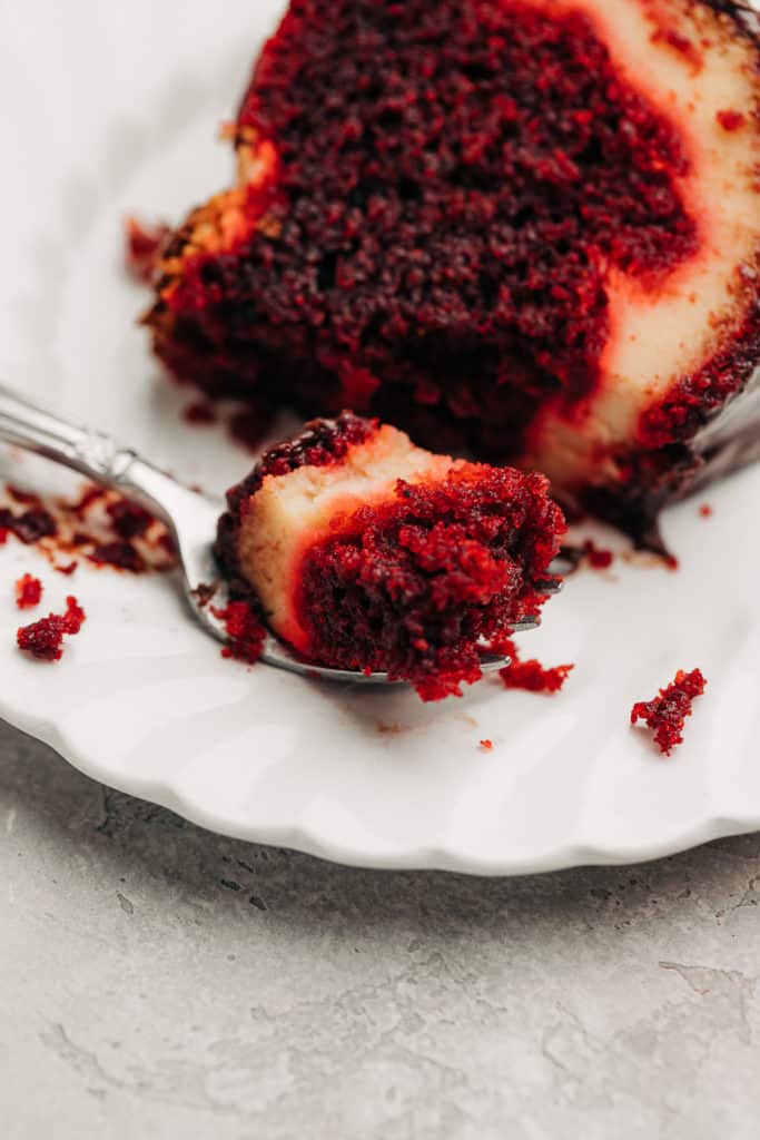 fork with a piece of Red Velvet Cream Cheese Bundt Cake