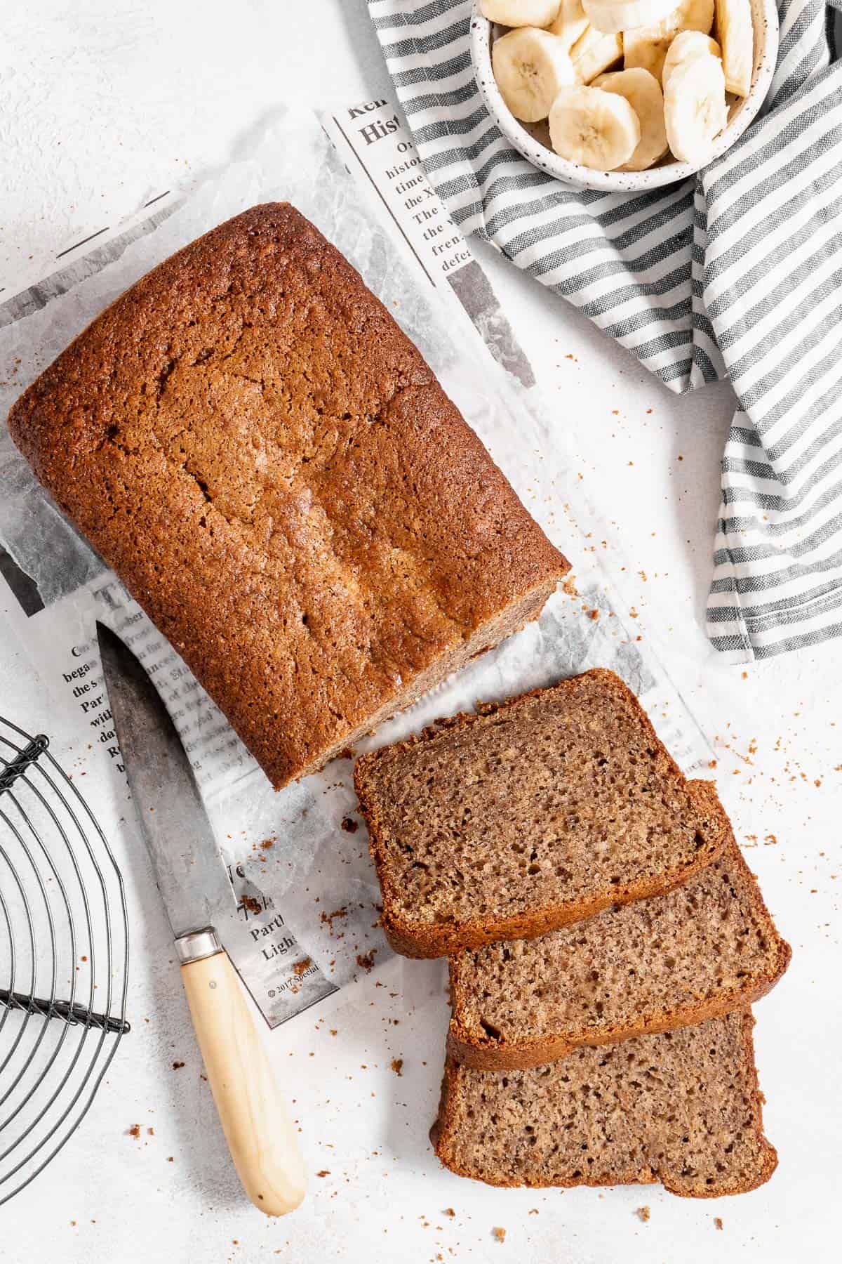 loaf of banana bread cut into slices.