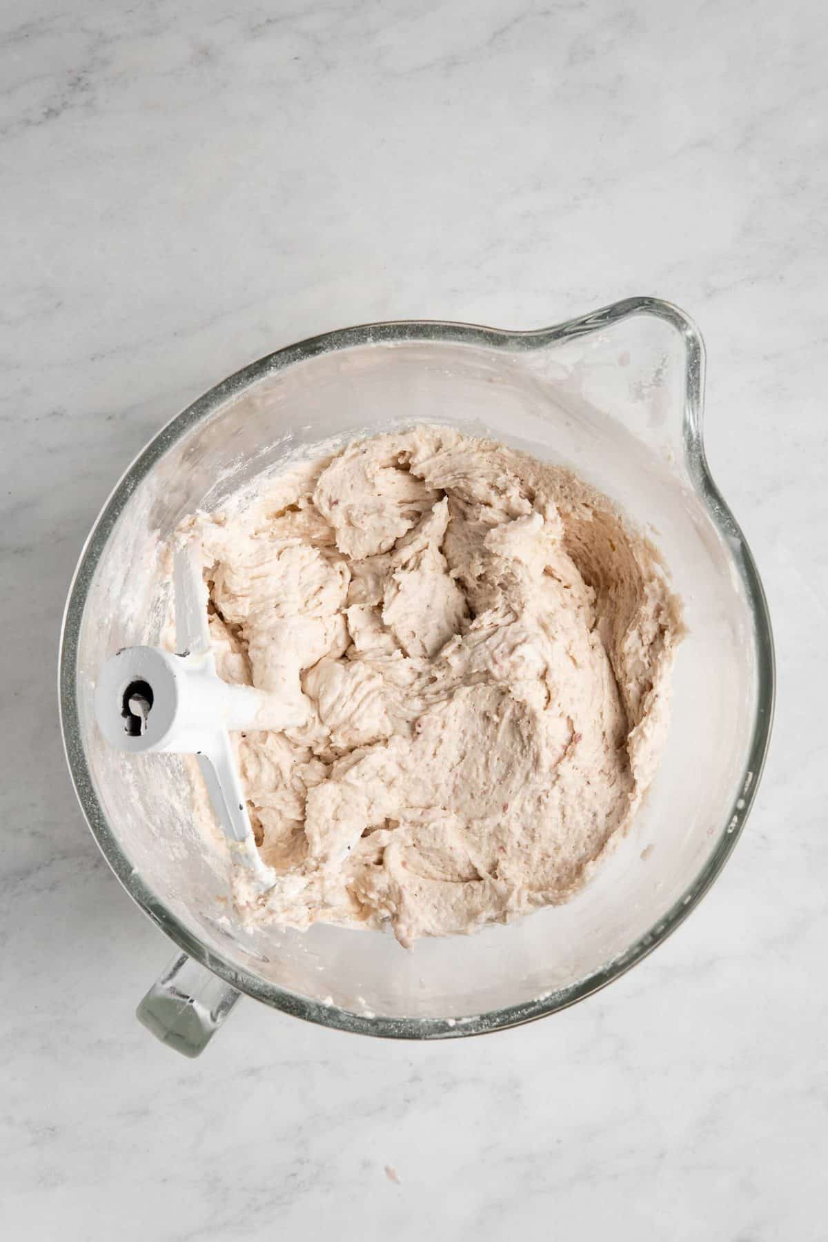 Strawberry cake batter in a mixing bowl.