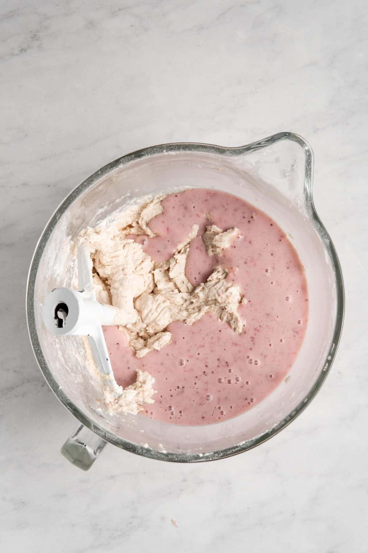 Strawberry cake batter in a mixing bowl.