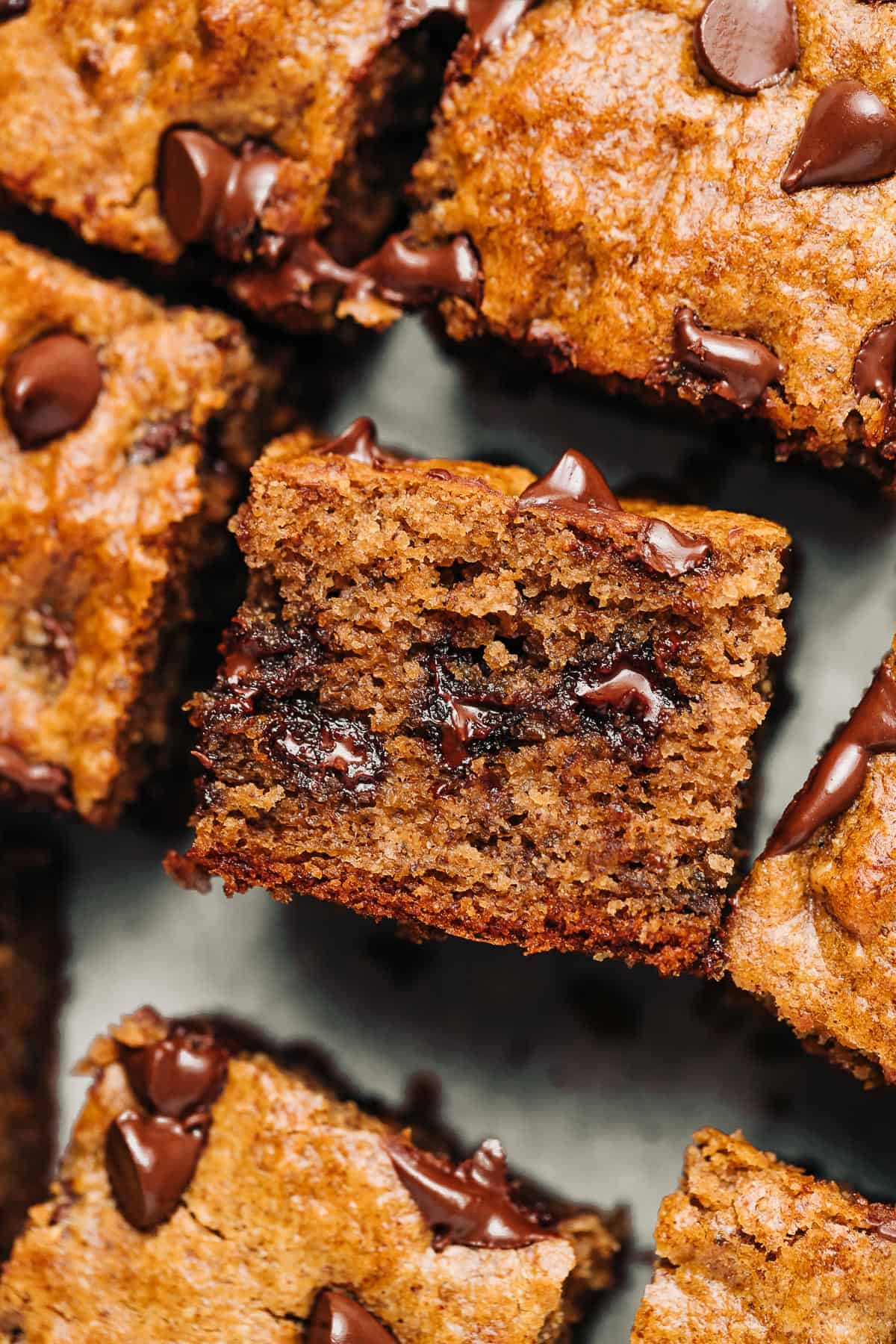 Paleo chocolate chip banana bread cut into squares.