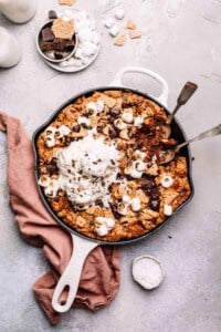 S'mores skillet cookie topped with ice cream.