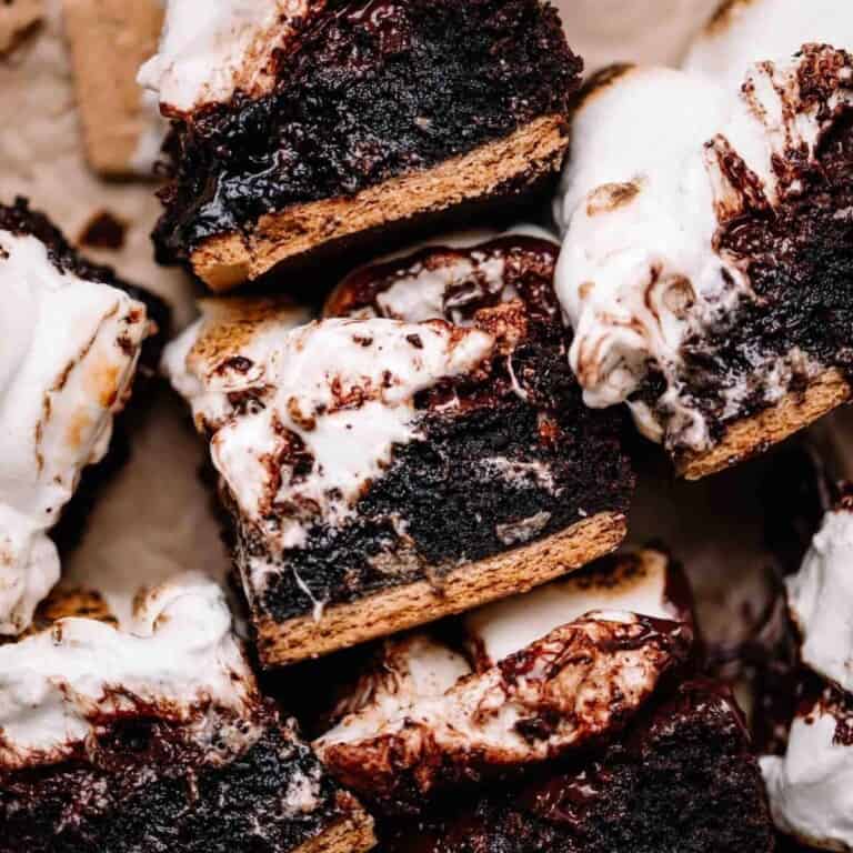 S'mores brownies on brown parchment paper.