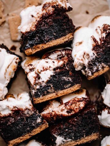 S'mores brownies on brown parchment paper.