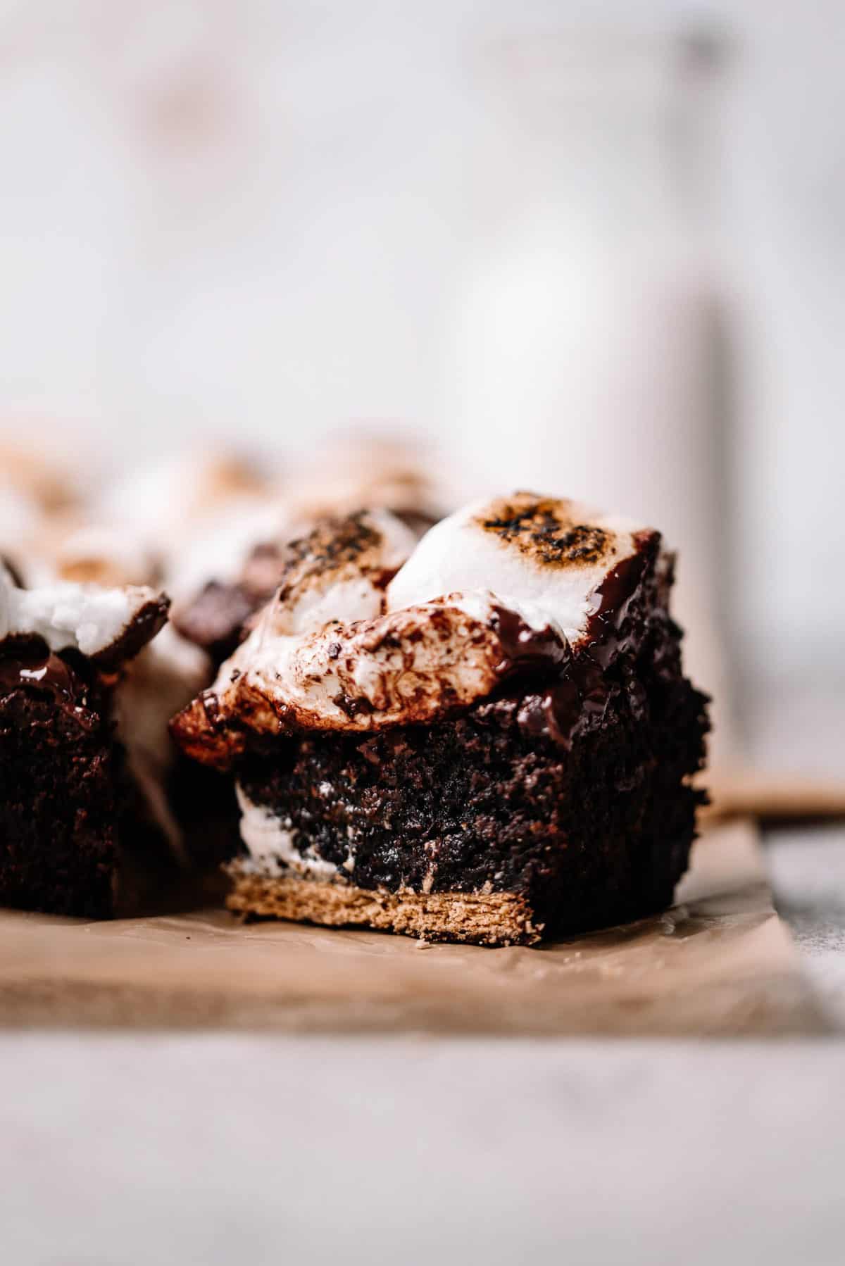 A s'mores brownie on parchment paper.