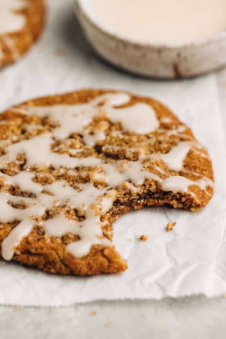 Spice cookie with a bite taken out of it.