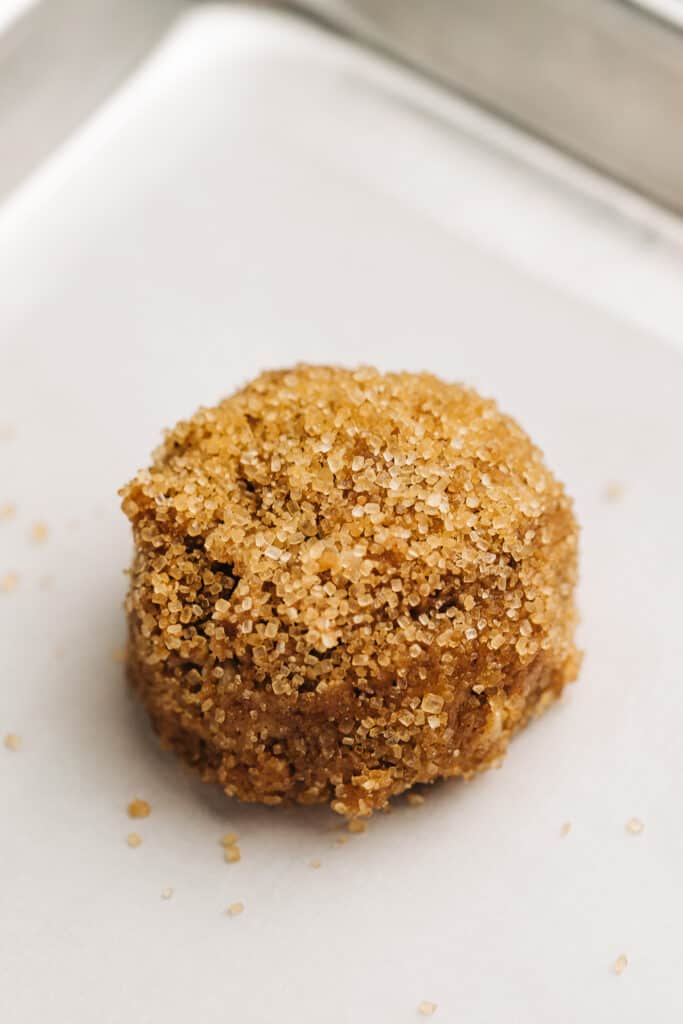 unbaked spice cookie on a baking sheet.