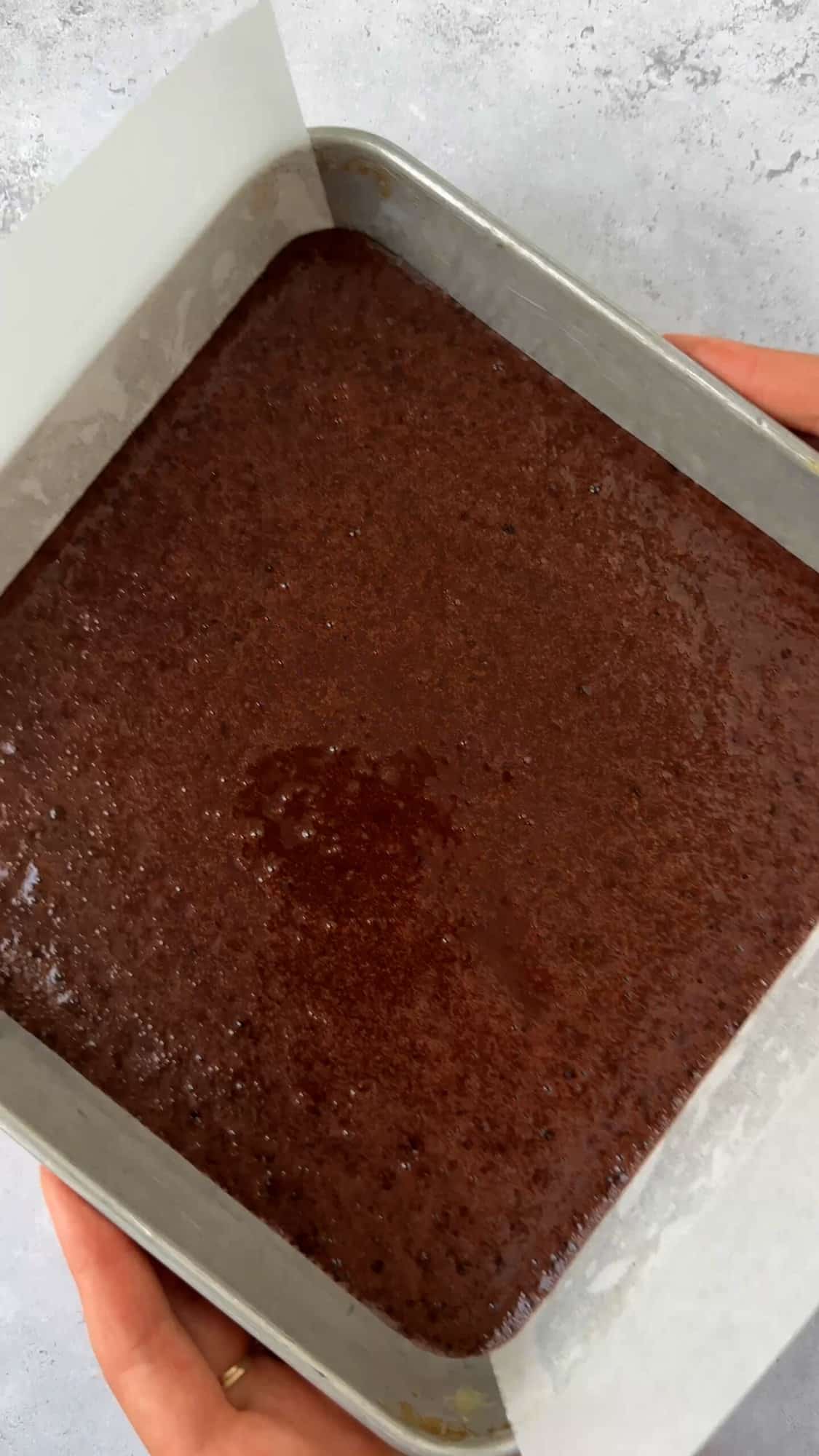 chocolate cake batter in a pan.