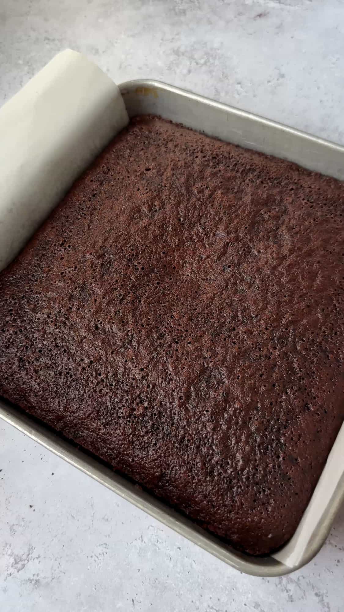 chocolate cake in baking pan.