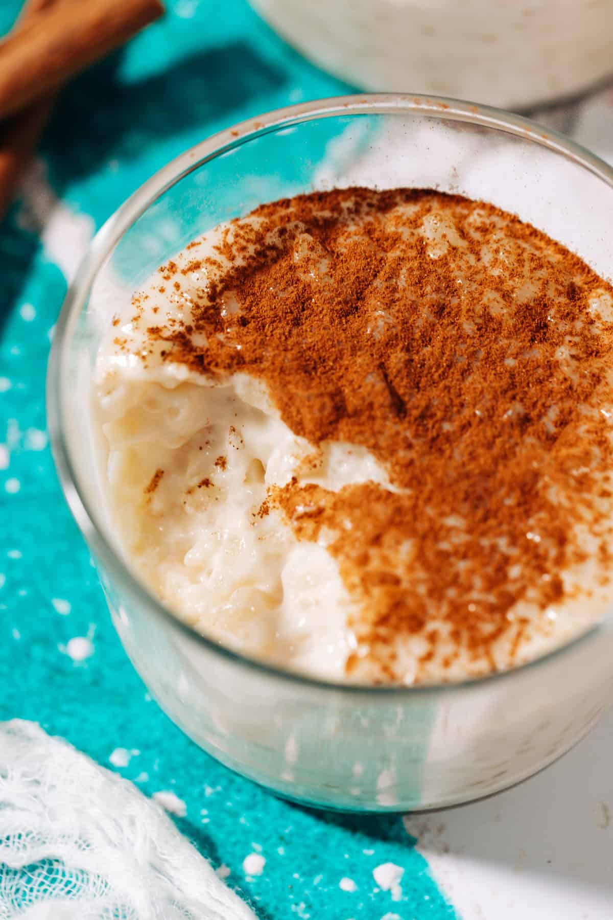 bowl of rizogalo topped with cinnamon.