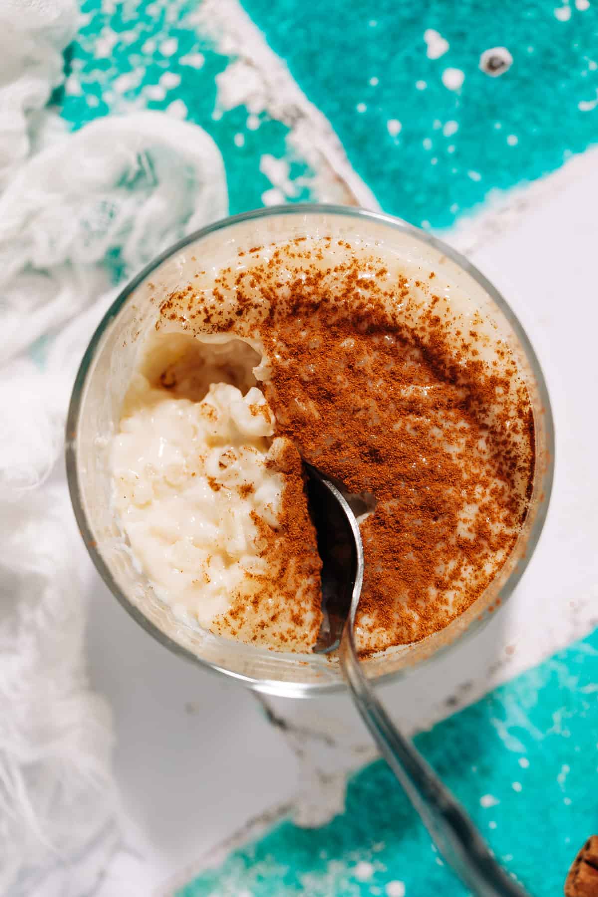 bowl of rizogalo topped with cinnamon.