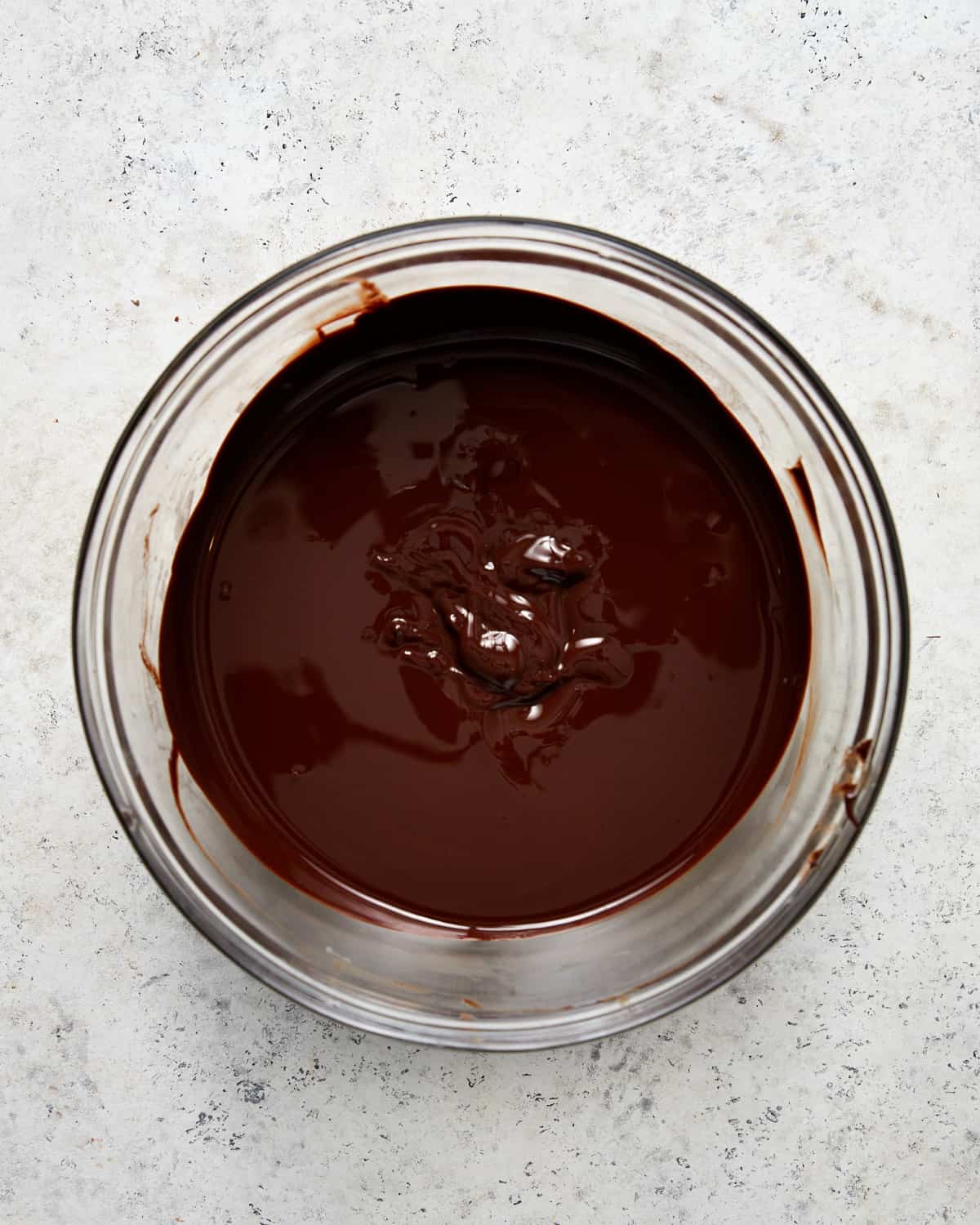 melted chocolate and butter in a bowl.