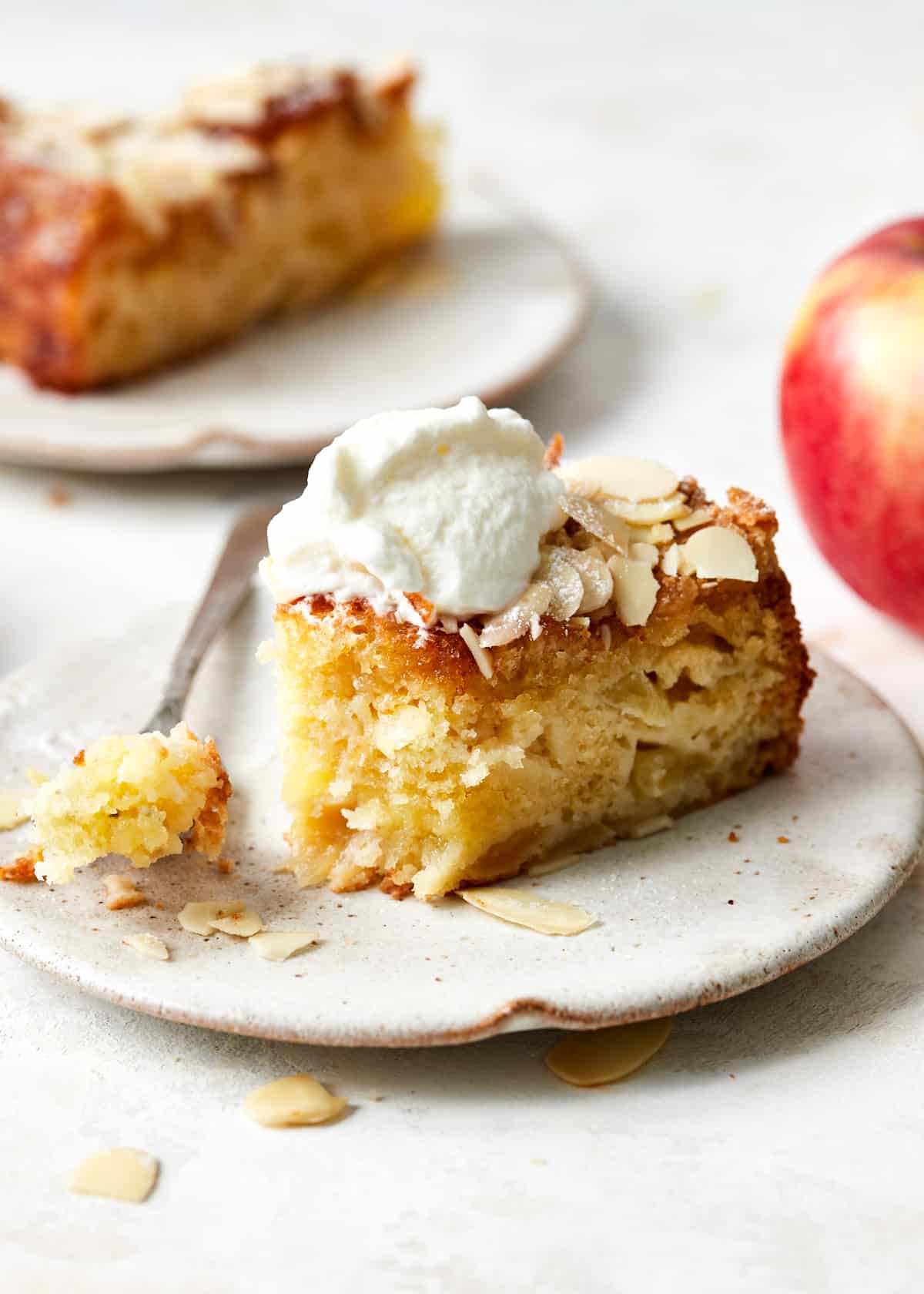 French apple cake with whipped cream.