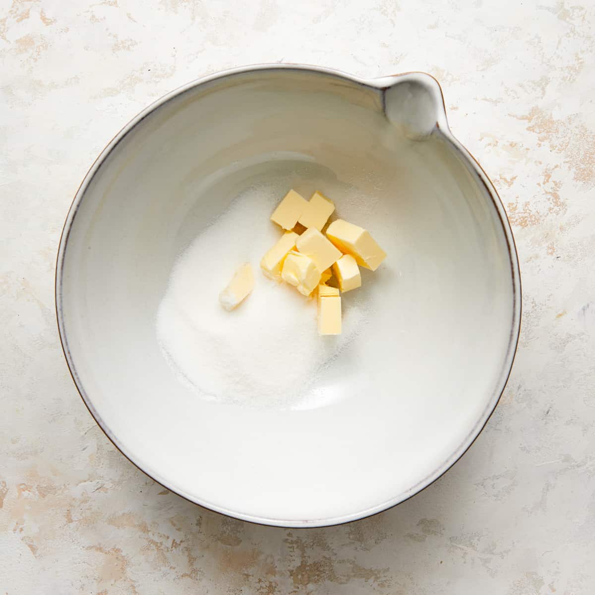 butter and sugar in a bowl.