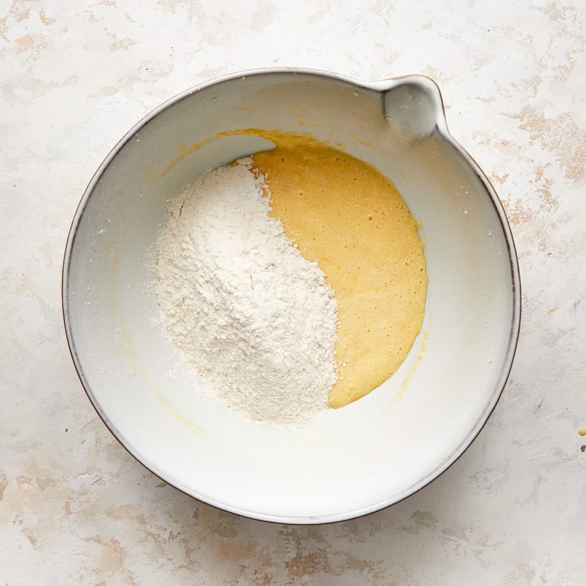 wet and dry ingredients in a bowl.