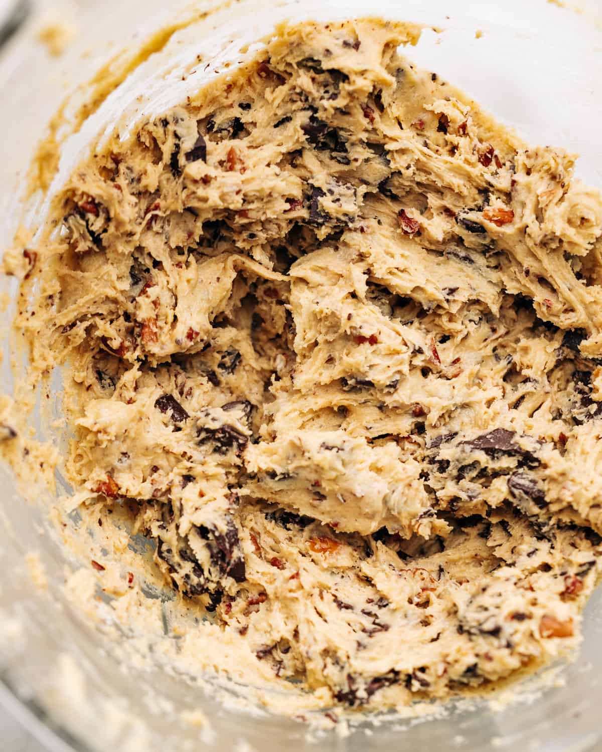 chocolate chip pecan cookie dough in a mixing bowl.