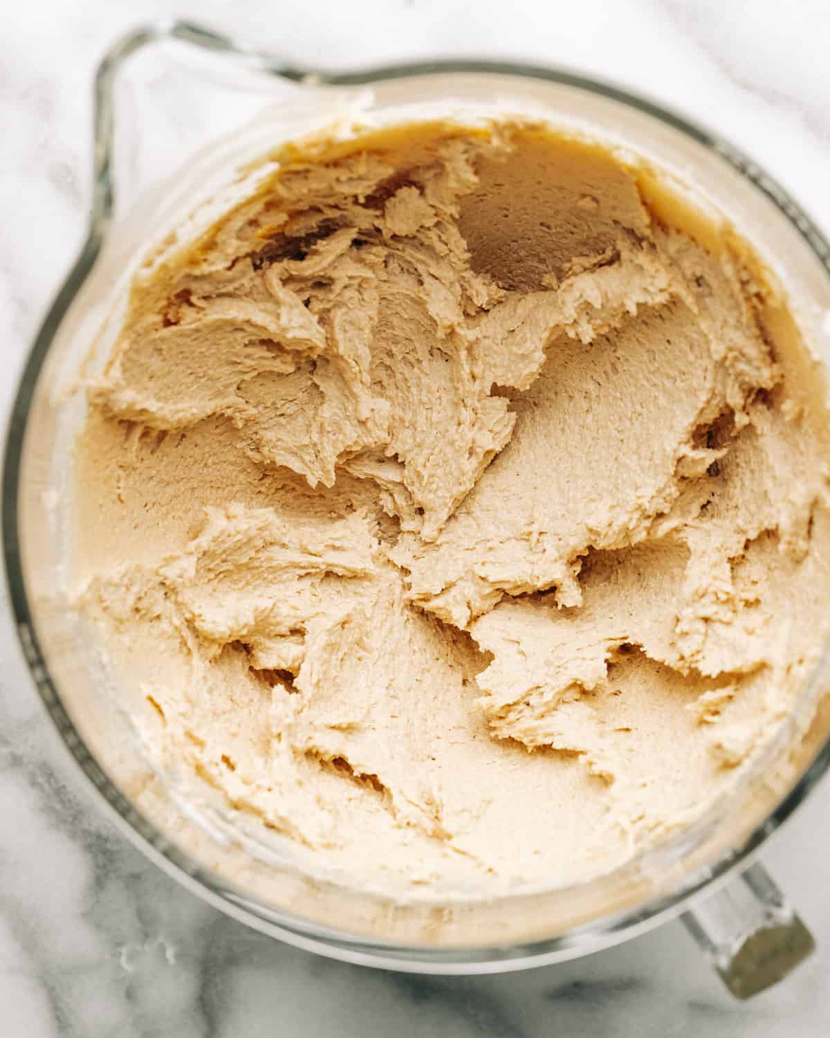 creamed butter and sugars in a mixing bowl.