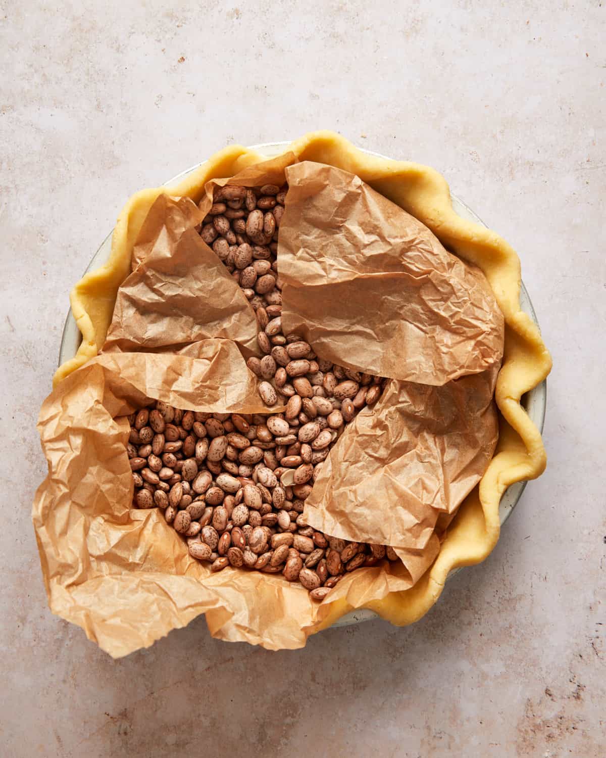 pie crust with pie weights.