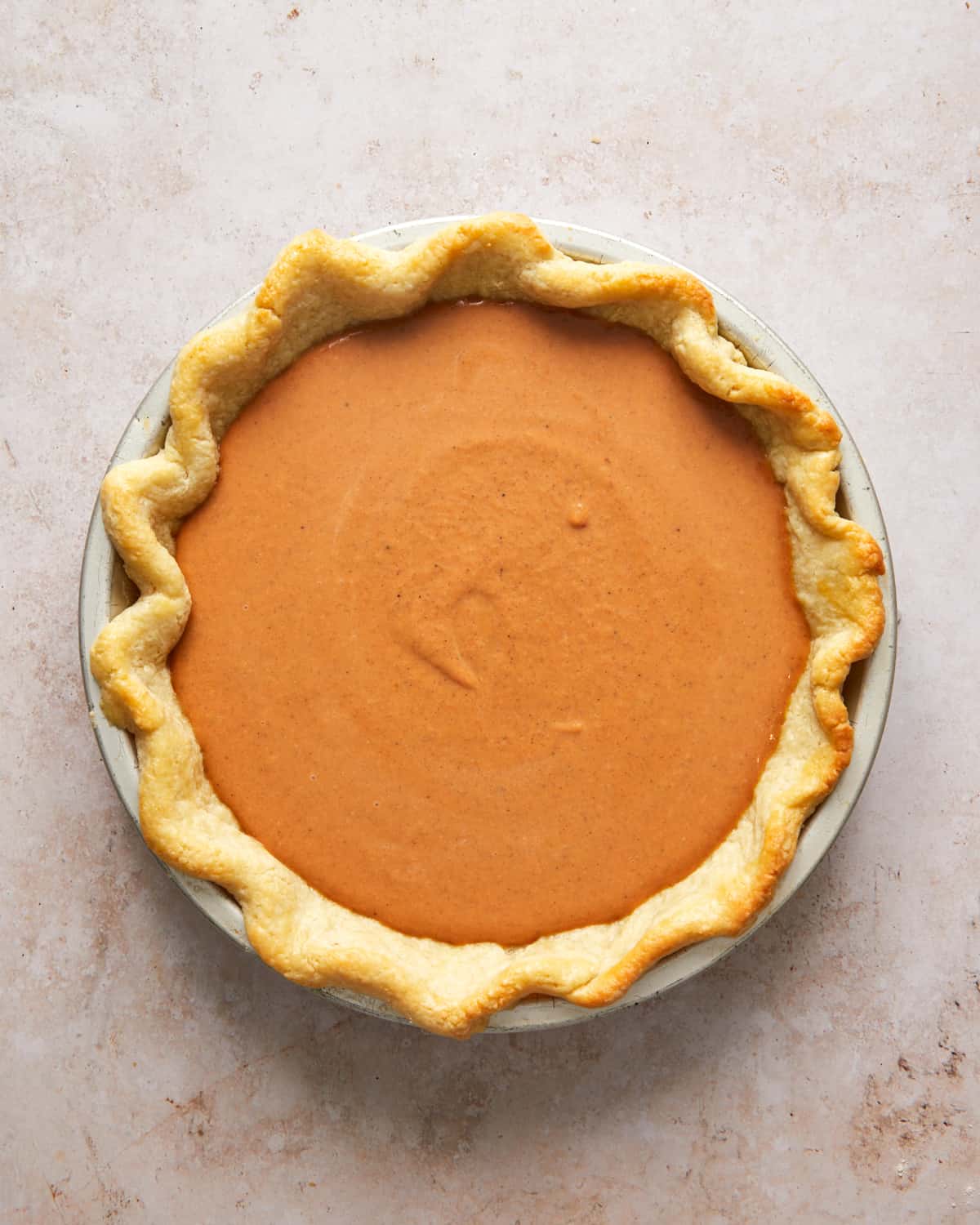 unbaked pumpkin pie.