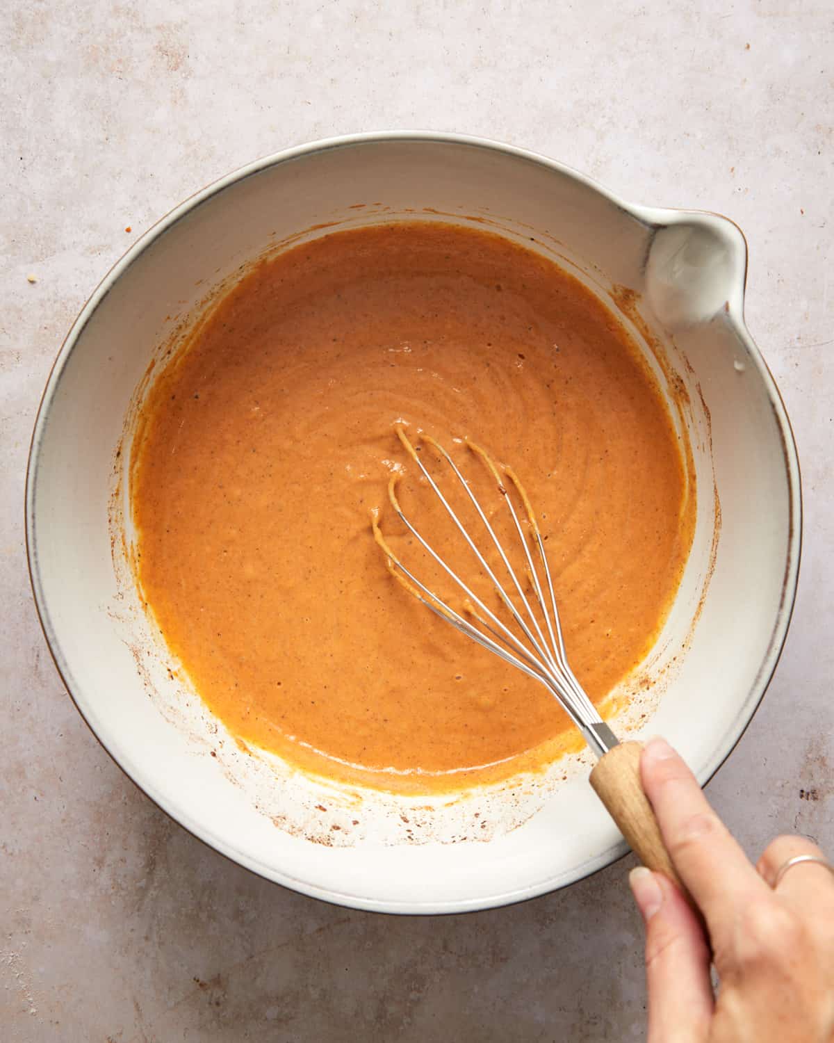 pumpkin pie filling in a mixing bowl.