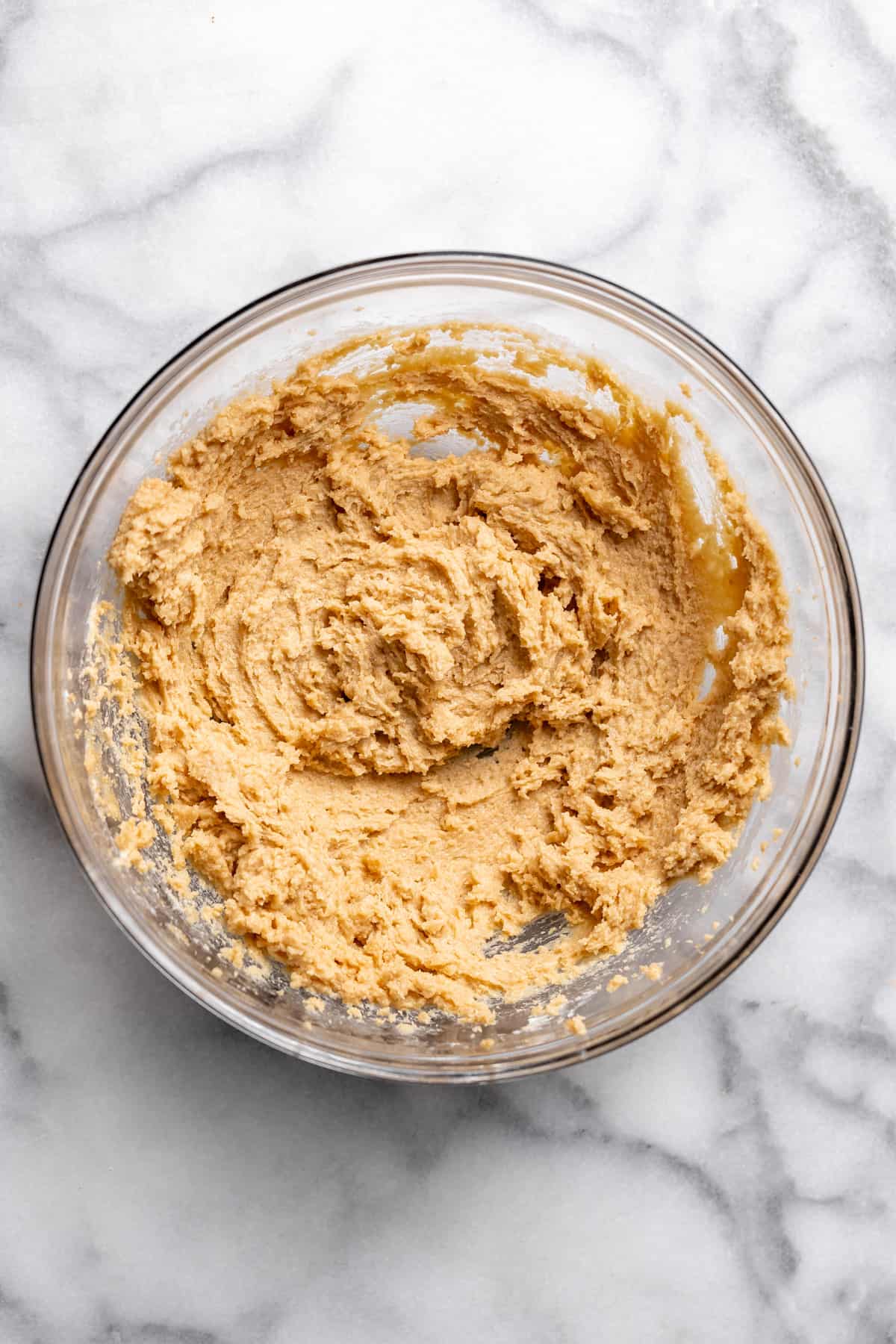 creamed butter with brown sugar in a mixing bowl.