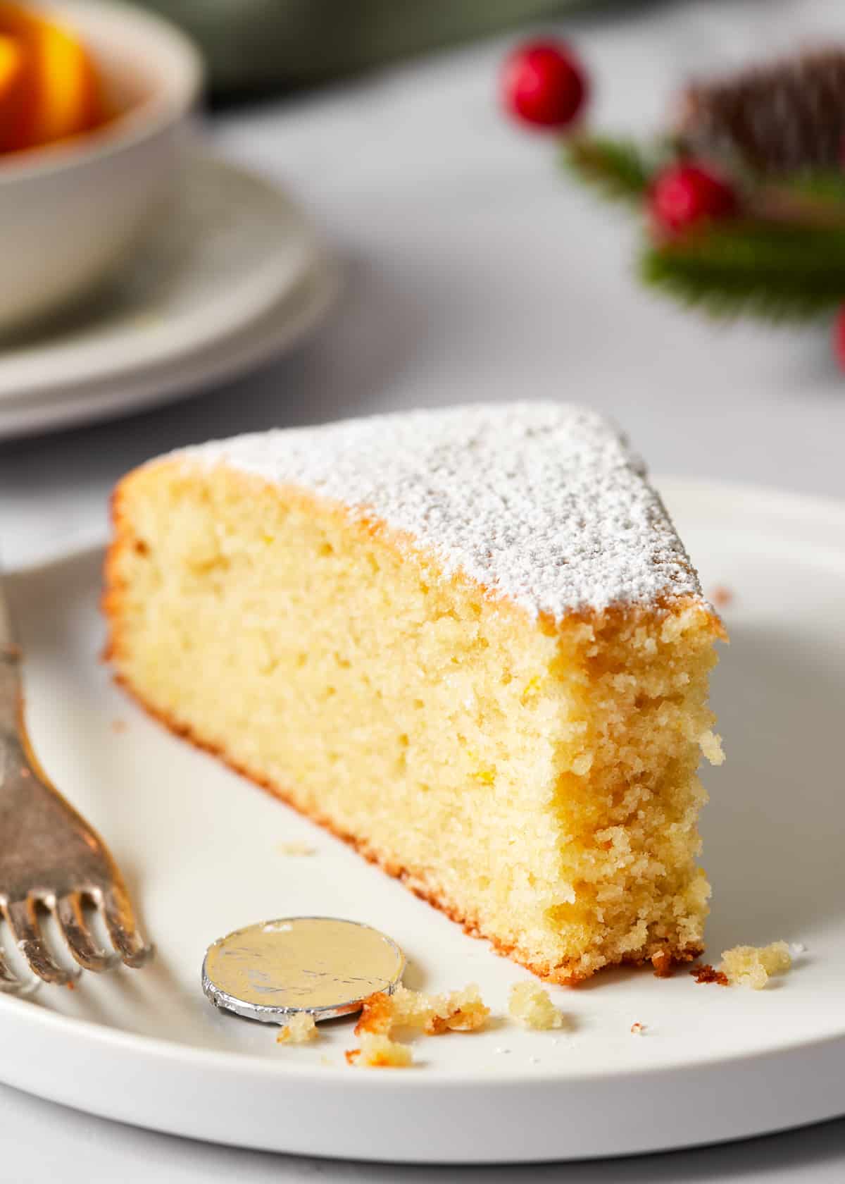 slice of vasilopita on a plate.