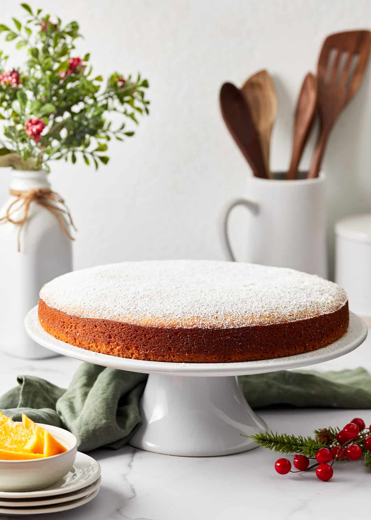 vasilopita on a cake stand.