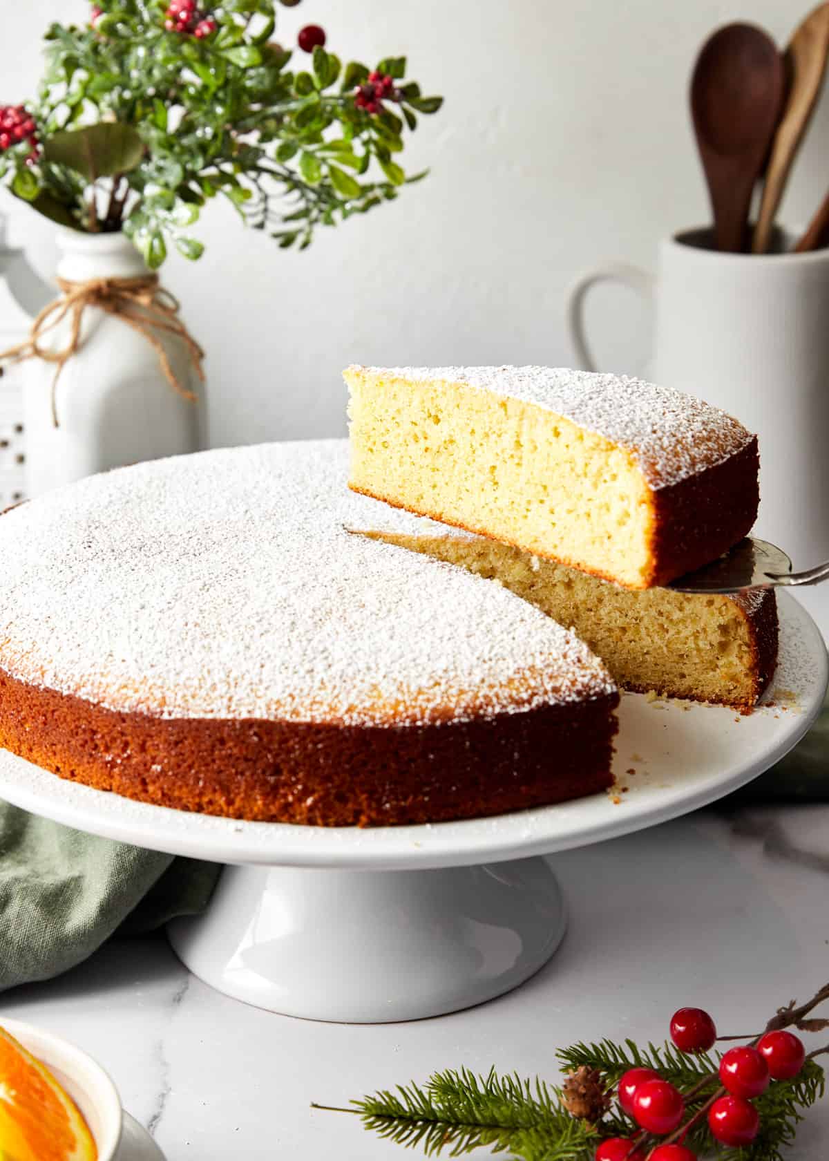 slice of vasilopita on a cake stand.