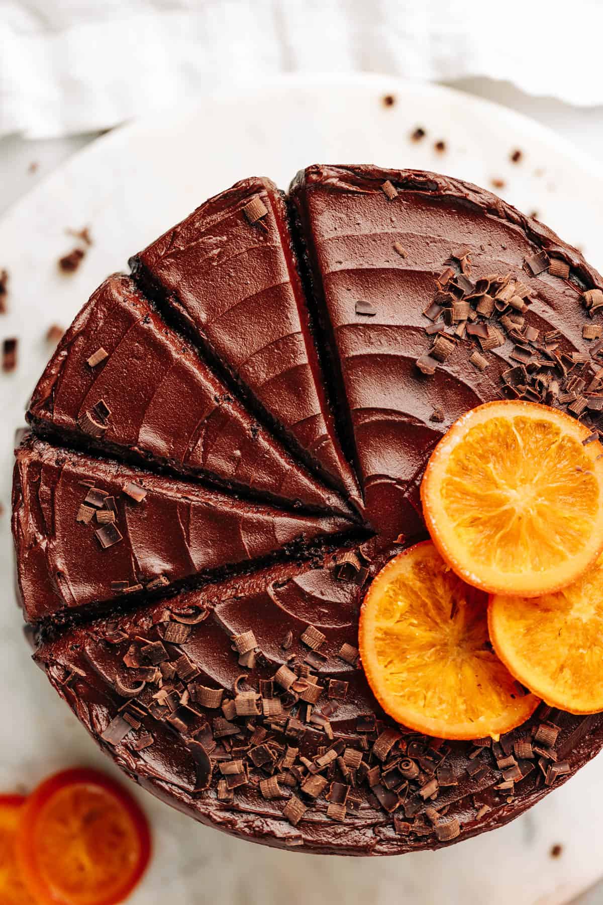 chocolate orange fudge frosting on a cake.