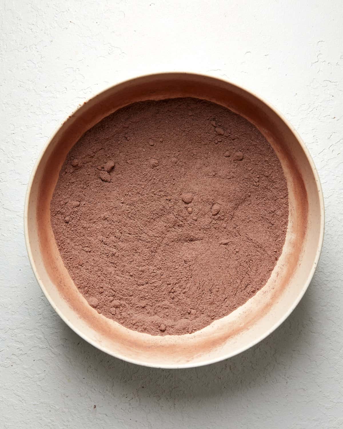 chocolate cupcake dry ingredients in a mixing bowl.
