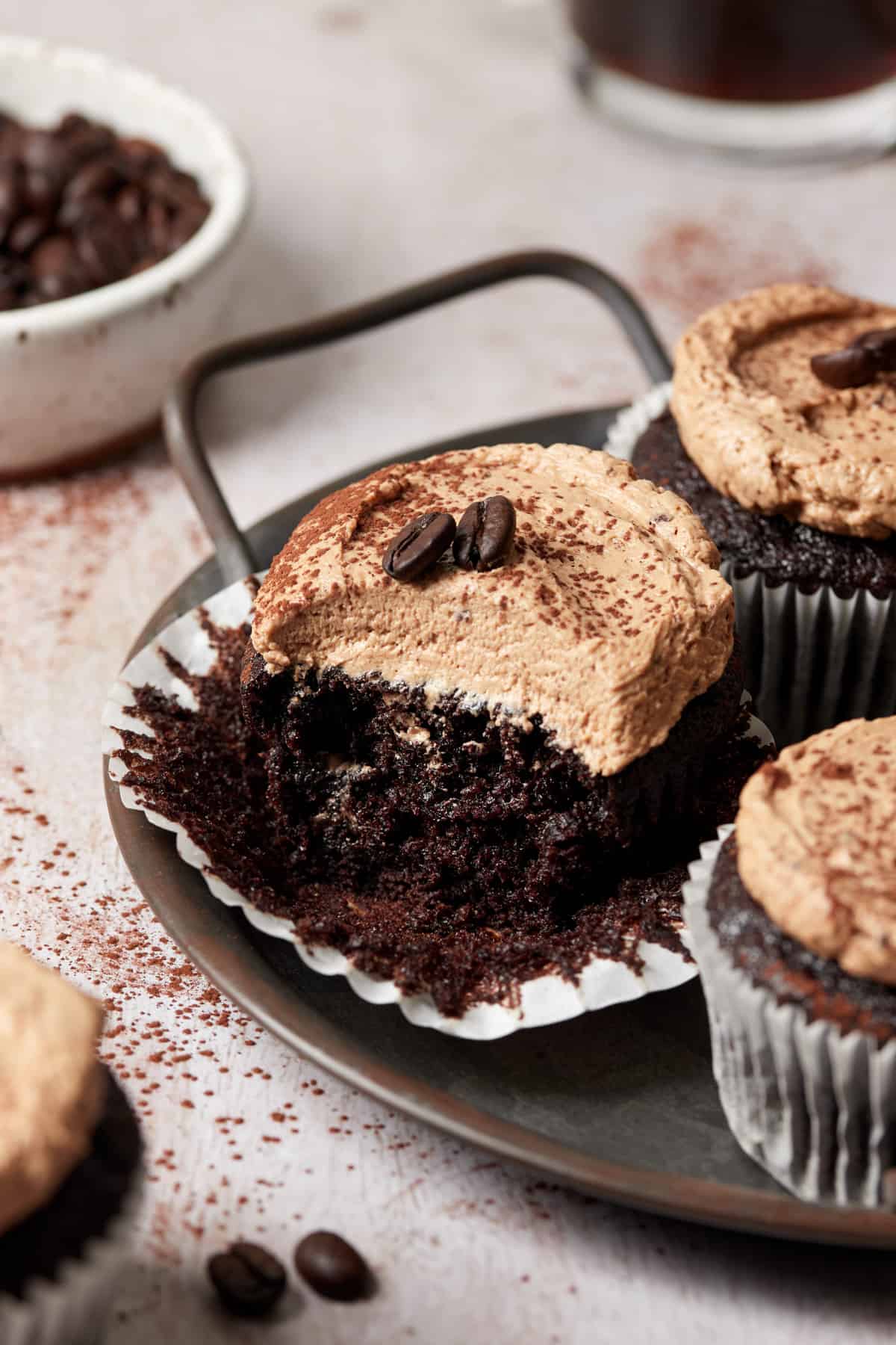 inside of a moist chocolate mocha cupcake topped with mocha buttercream frosting.